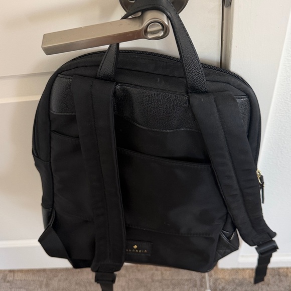 Black Backpack with Gold Accents.. Nylon - Picture 2 of 3